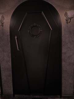 The coffin door at the store entrance